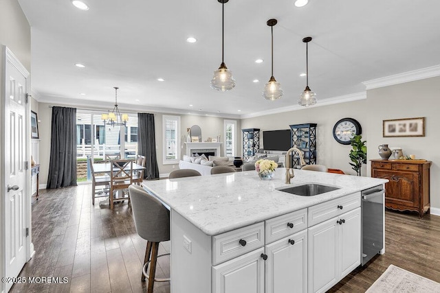 30 Malcolm Way, Lincroft, NJ 07738 - kitchen with a fireplace, white cabinets, recessed lighting, a kitchen island with sink, and dark wood-style flooring