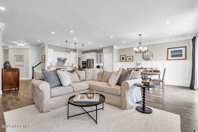 30 Malcolm Way, Lincroft, NJ 07738 - living room featuring ornamental molding, dark wood-style flooring, recessed lighting, stairs, and a chandelier