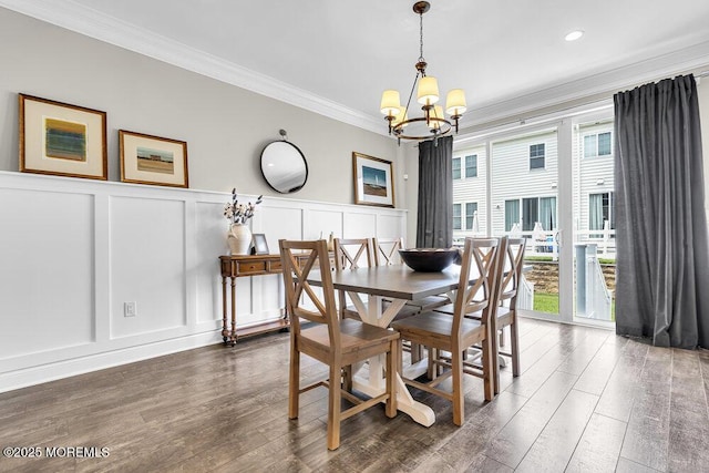 30 Malcolm Way, Lincroft, NJ 07738 - dining space with a decorative wall, a chandelier, ornamental molding, wood finished floors, and a wainscoted wall