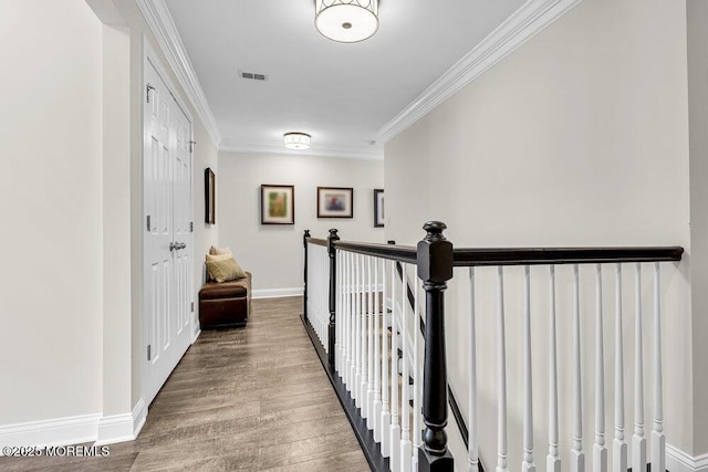 30 Malcolm Way, Lincroft, NJ 07738 - corridor featuring crown molding, wood finished floors, and an upstairs landing