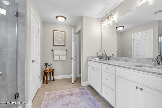 30 Malcolm Way, Lincroft, NJ 07738 - bathroom with double vanity and a stall shower