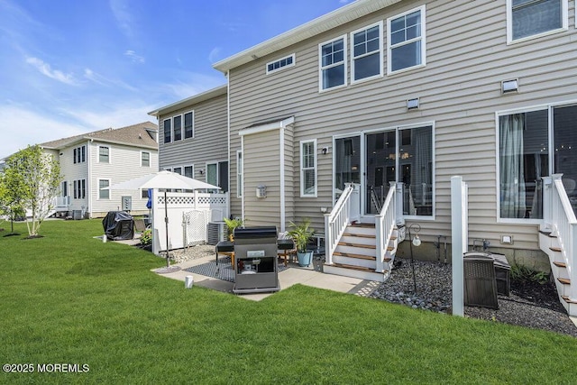 30 Malcolm Way, Lincroft, NJ 07738 - rear view of house featuring a lawn and a patio