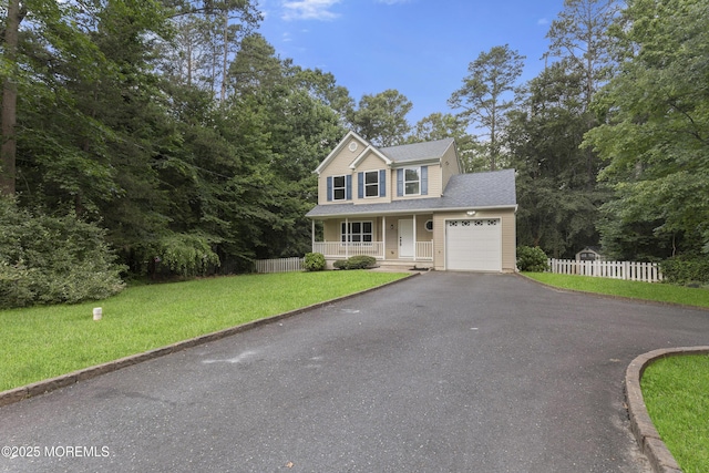 10 Postol Rd, Cream Ridge, NJ 08514 - traditional home featuring covered porch, an attached garage, and asphalt driveway