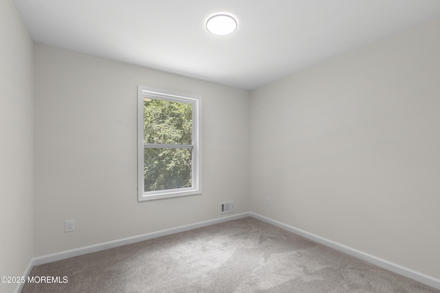 10 Postol Rd, Cream Ridge, NJ 08514 - carpeted spare room featuring baseboards