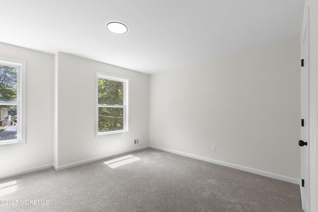 10 Postol Rd, Cream Ridge, NJ 08514 - carpeted empty room featuring baseboards