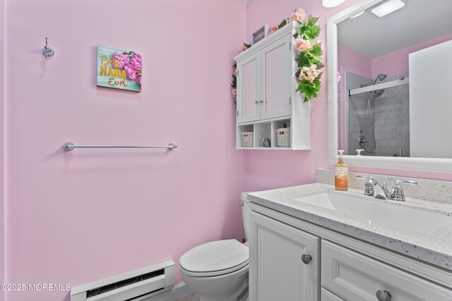 799B Westminster Ct Unit B, Manchester, NJ 08759 - full bathroom with baseboard heating, tiled shower, and vanity
