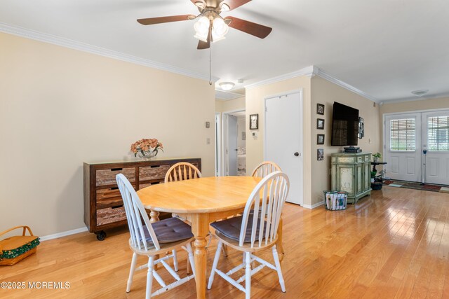 799B Westminster Ct Unit B, Manchester, NJ 08759 - dining area featuring light wood finished floors, crown molding, and a ceiling fan