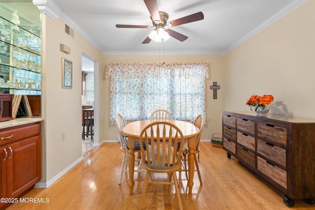 799B Westminster Ct Unit B, Manchester, NJ 08759 - dining space with a ceiling fan, ornamental molding, and light wood-style flooring