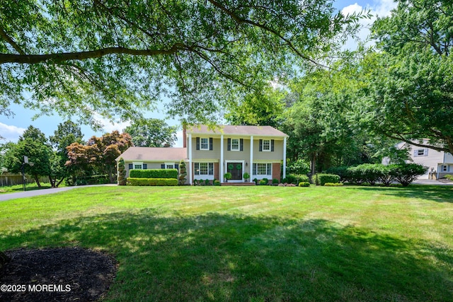 9 Partridge Ave, Freehold, NJ 07728 - view of front facade featuring a front lawn