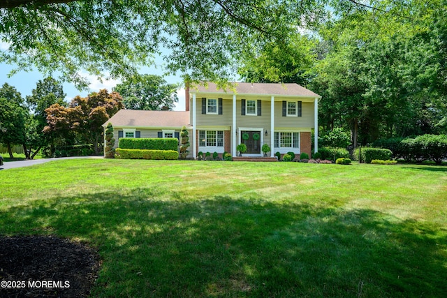 9 Partridge Ave, Freehold, NJ 07728 - view of front of house with a front lawn