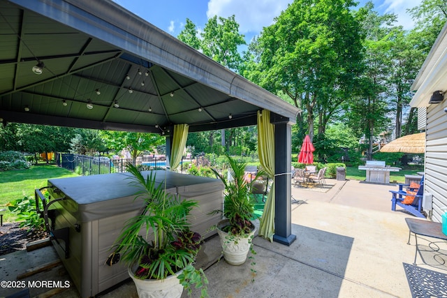 9 Partridge Ave, Freehold, NJ 07728 - view of patio featuring a hot tub, a gazebo, grilling area, and outdoor dining area