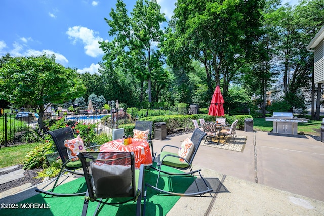 9 Partridge Ave, Freehold, NJ 07728 - view of patio featuring outdoor dining space, grilling area, and view of scattered trees