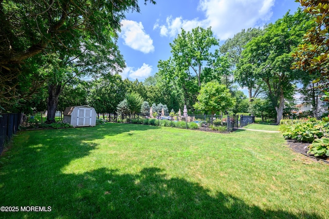 9 Partridge Ave, Freehold, NJ 07728 - fenced backyard featuring a storage unit