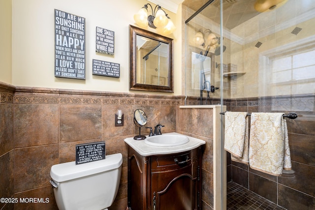 9 Partridge Ave, Freehold, NJ 07728 - full bath featuring tile walls, vanity, a shower stall, and wainscoting