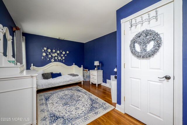 9 Partridge Ave, Freehold, NJ 07728 - bedroom featuring wood finished floors and baseboards