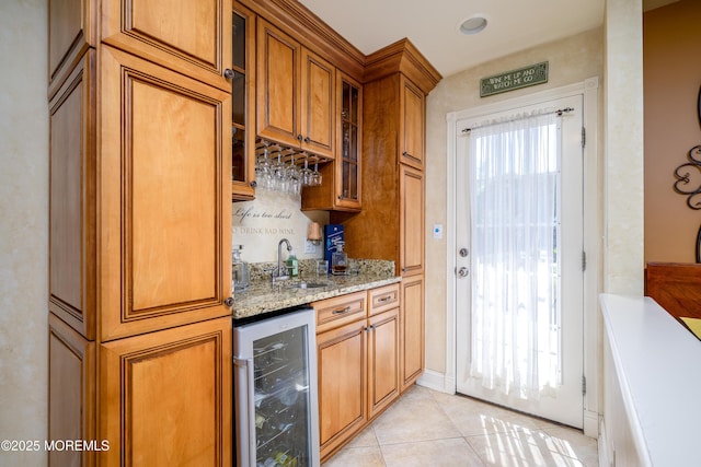 9 Partridge Ave, Freehold, NJ 07728 - indoor wet bar featuring beverage cooler and light tile patterned flooring