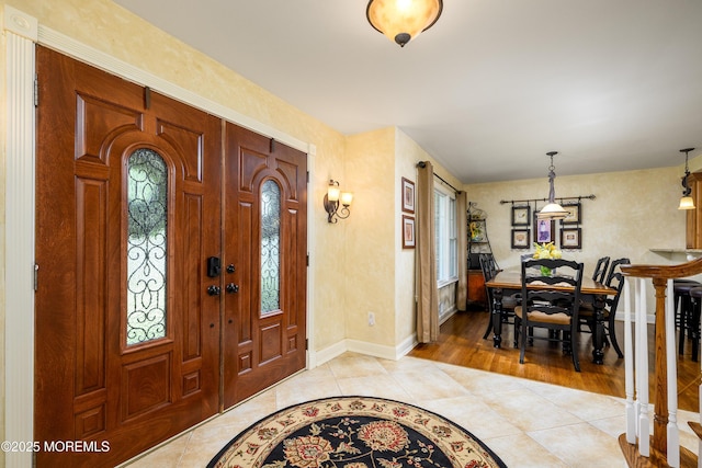 9 Partridge Ave, Freehold, NJ 07728 - entryway featuring light tile patterned floors and baseboards