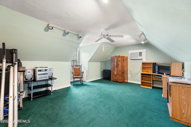 12 Liberty St, Old Bridge, NJ 08857 - carpeted office space with track lighting, a wall mounted AC, a ceiling fan, vaulted ceiling, and a textured ceiling