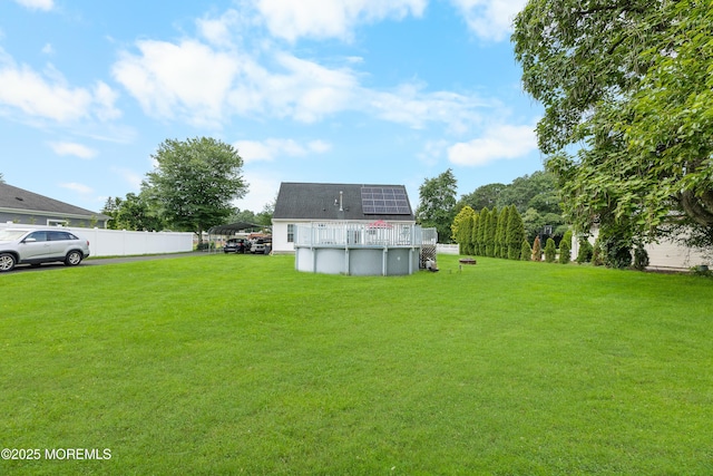 12 Liberty St, Old Bridge, NJ 08857 - back of property featuring a detached carport and an outdoor pool