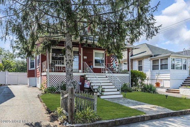 194 Washington St, Keyport, NJ 07735 - view of front of property with stairway, covered porch, a gate, and driveway