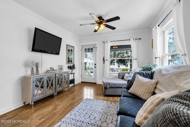 194 Washington St, Keyport, NJ 07735 - living area featuring healthy amount of natural light, ceiling fan, wood finished floors, and crown molding