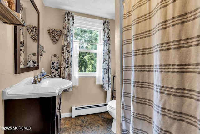 194 Washington St, Keyport, NJ 07735 - bathroom featuring a baseboard radiator, vanity, and a shower with shower curtain
