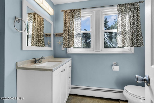 194 Washington St, Keyport, NJ 07735 - bathroom featuring a baseboard heating unit and vanity