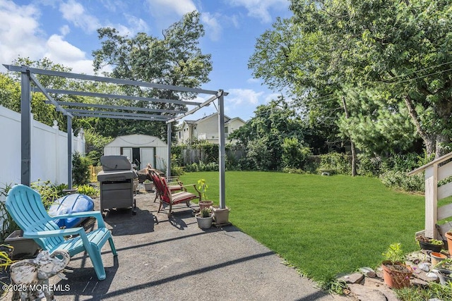 194 Washington St, Keyport, NJ 07735 - fenced backyard featuring a storage unit and a patio