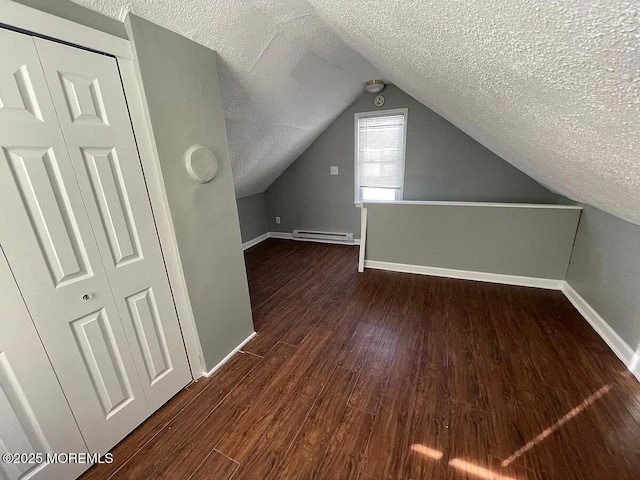 195 Atlantic St, Keyport, NJ 07735 - bonus room featuring baseboard heating, a textured ceiling, wood finished floors, and lofted ceiling