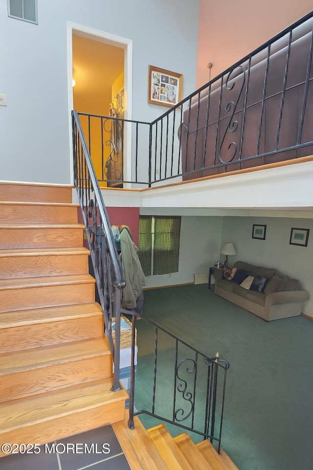 20 Woodridge Ave, Toms River, NJ 08755 - stairway with carpet floors and a towering ceiling