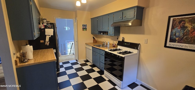 20 Woodridge Ave, Toms River, NJ 08755 - kitchen featuring white appliances, under cabinet range hood, light floors, and light countertops