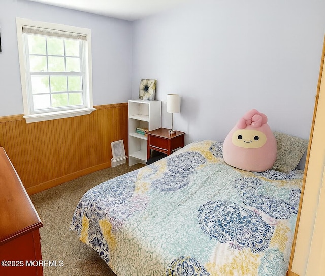 20 Woodridge Ave, Toms River, NJ 08755 - carpeted bedroom featuring a wainscoted wall and wooden walls