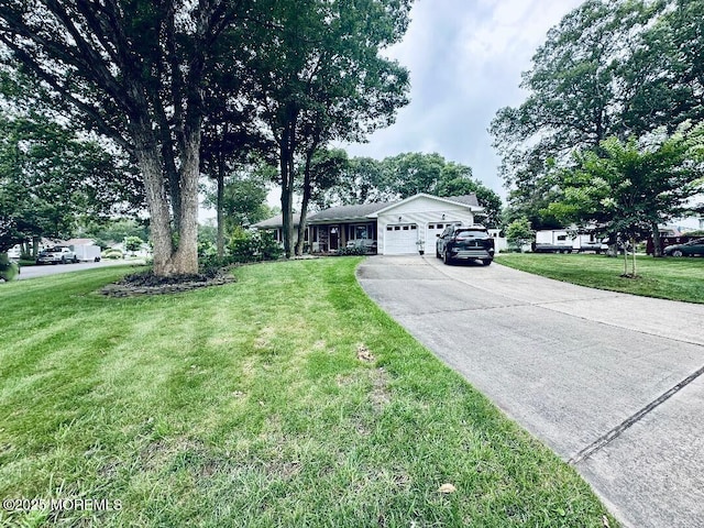 412 Steuben Ave, Forked River, NJ 08731 - single story home featuring an attached garage, a front yard, and concrete driveway
