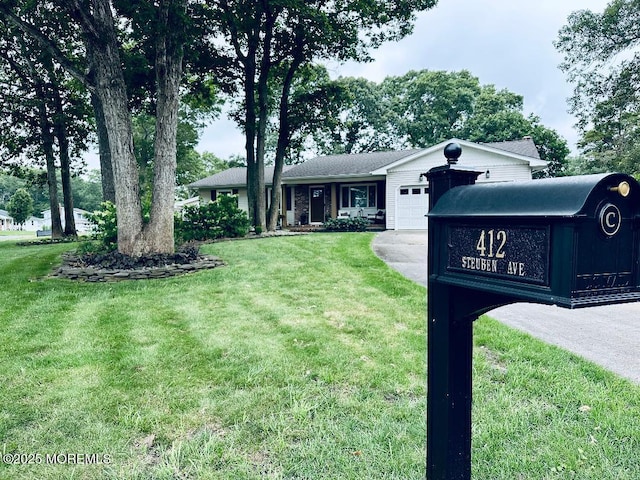 412 Steuben Ave, Forked River, NJ 08731 - single story home with an attached garage, driveway, and a front lawn