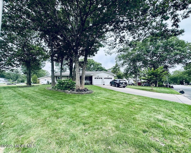 412 Steuben Ave, Forked River, NJ 08731 - view of front of property with asphalt driveway, a garage, and a front lawn