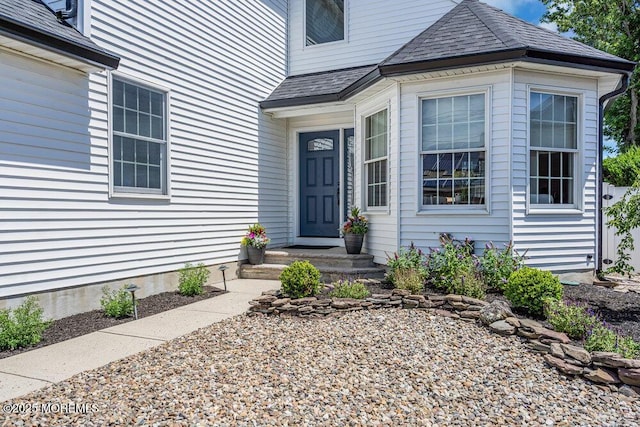 17 W Coral Dr, Brick, NJ 08723 - doorway to property featuring roof with shingles
