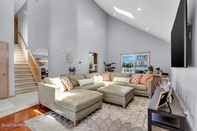 17 W Coral Dr, Brick, NJ 08723 - living area with high vaulted ceiling, stairs, a skylight, recessed lighting, and light wood-type flooring