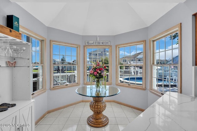 17 W Coral Dr, Brick, NJ 08723 - dining space with vaulted ceiling and light tile patterned flooring