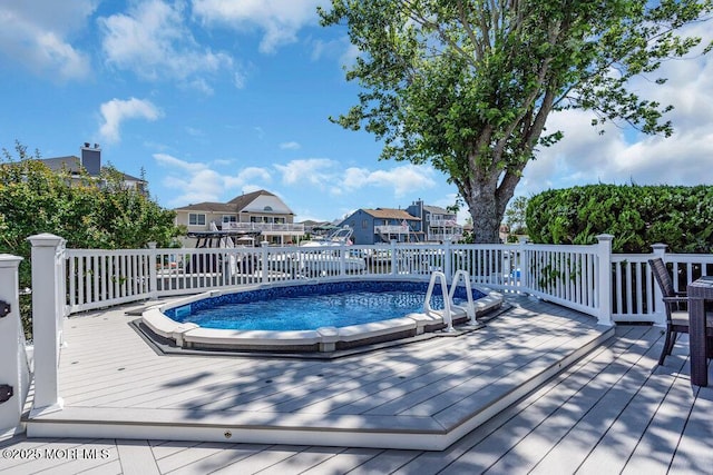 17 W Coral Dr, Brick, NJ 08723 - swimming pool with a deck and a residential view