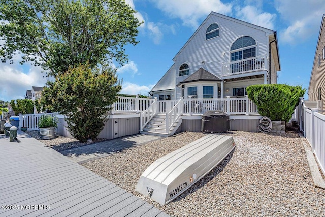 17 W Coral Dr, Brick, NJ 08723 - back of property featuring a fenced backyard and a deck