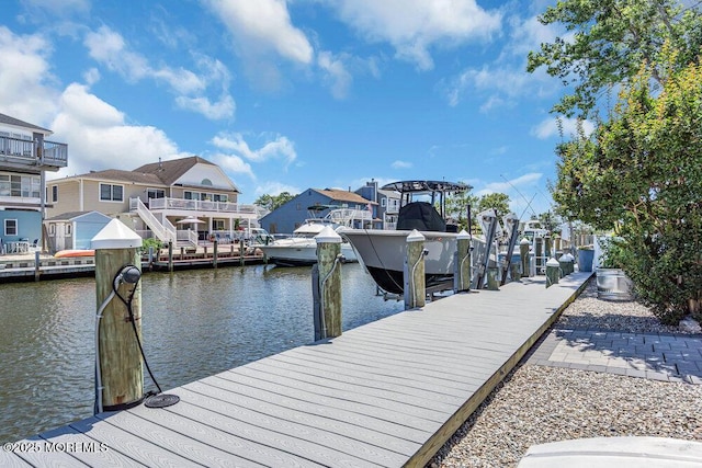 17 W Coral Dr, Brick, NJ 08723 - dock area with boat lift, a residential view, and a water view