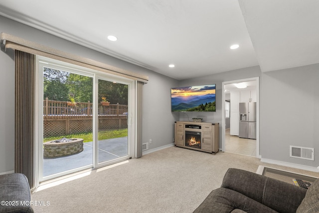 1 Spruce Way, Manalapan, NJ 07726 - living area featuring light carpet, a lit fireplace, and recessed lighting