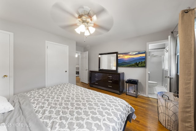 1 Spruce Way, Manalapan, NJ 07726 - bedroom featuring wood finished floors, ensuite bath, and a ceiling fan