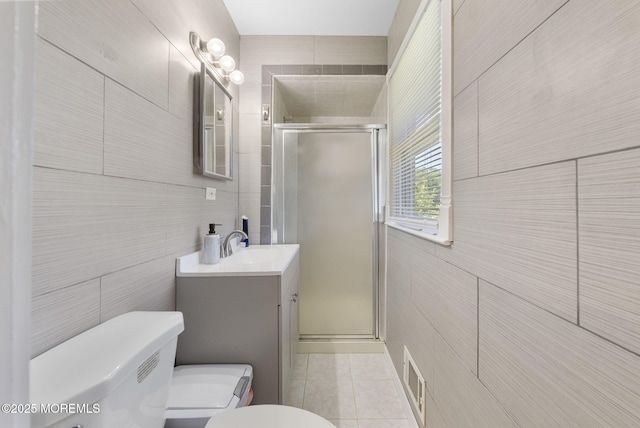 1 Spruce Way, Manalapan, NJ 07726 - bathroom with tile walls, tile patterned floors, vanity, and a shower stall