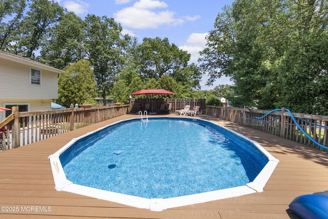 1 Spruce Way, Manalapan, NJ 07726 - view of swimming pool featuring a deck and a fenced backyard