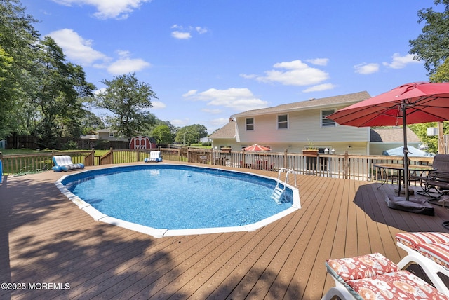 1 Spruce Way, Manalapan, NJ 07726 - view of pool featuring a shed, a deck, and outdoor dining area