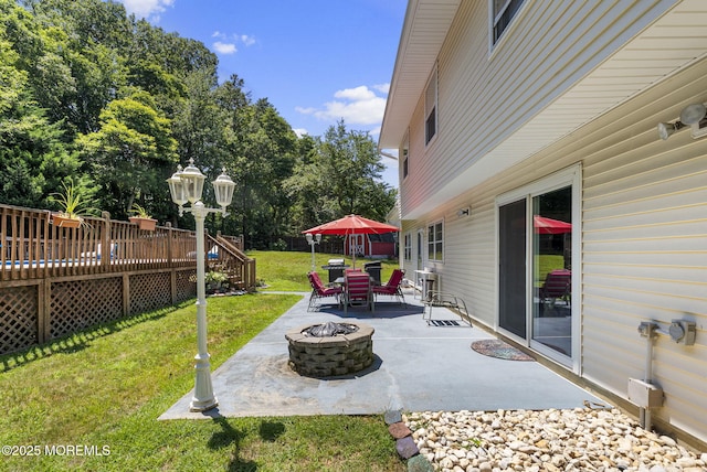 1 Spruce Way, Manalapan, NJ 07726 - view of patio with a fire pit, a deck, and outdoor dining area