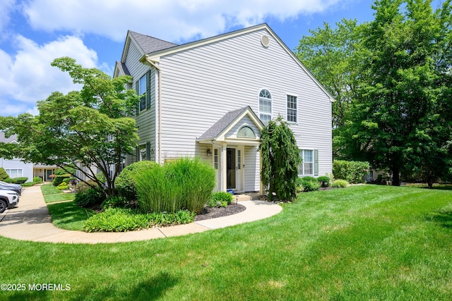 45 Liverpool Ct Unit 10, Freehold, NJ 07728 - view of front of house with a front lawn