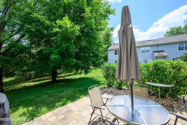 45 Liverpool Ct Unit 10, Freehold, NJ 07728 - view of patio featuring outdoor dining space