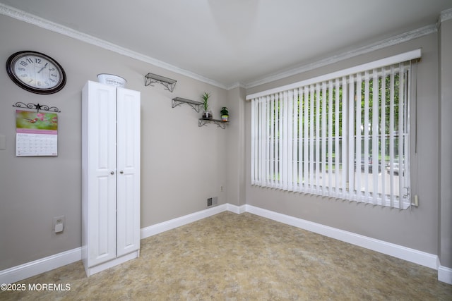 45 Liverpool Ct Unit 10, Freehold, NJ 07728 - spare room with healthy amount of natural light and ornamental molding